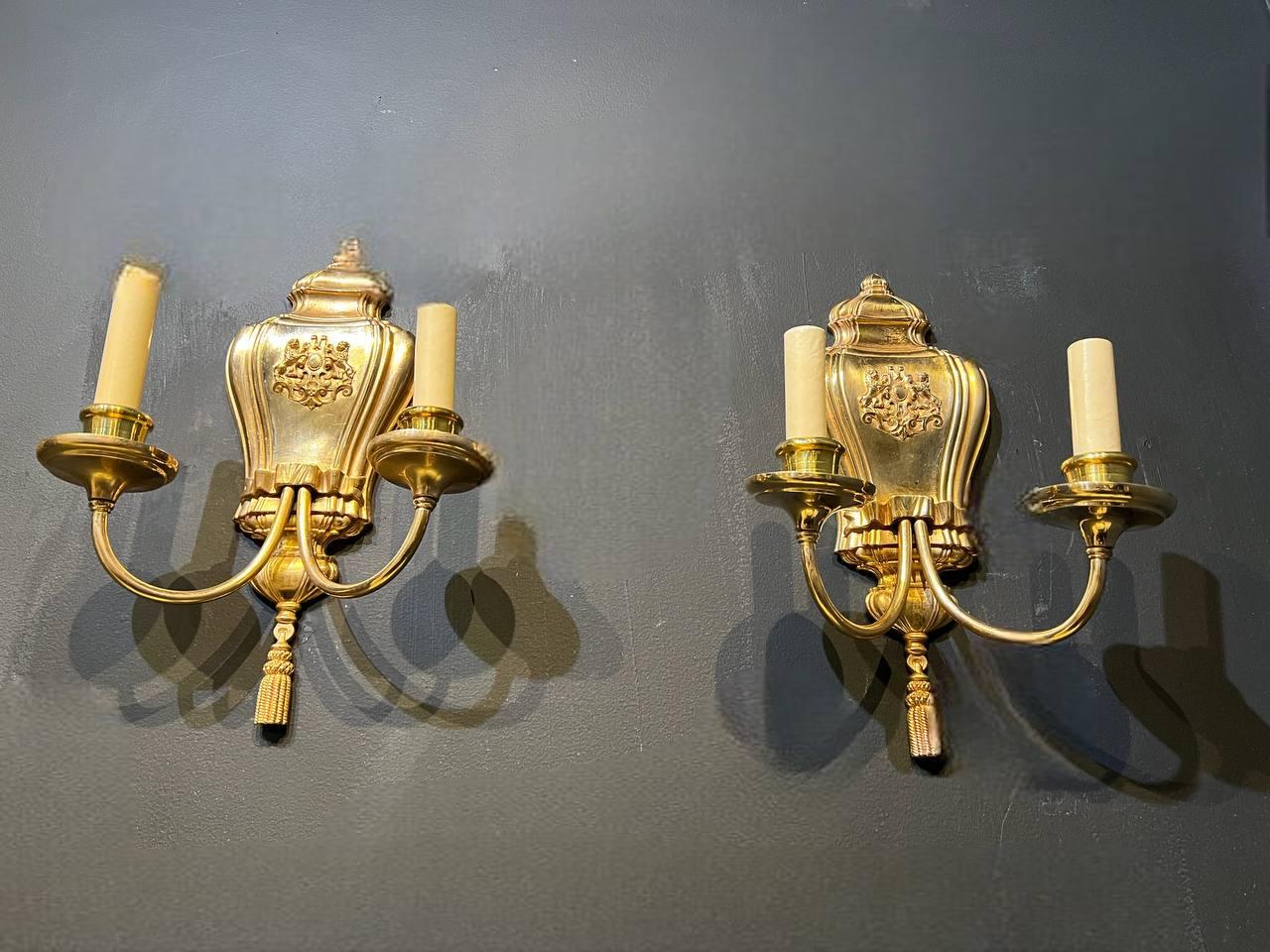 American 1920's Caldwell Gilt Bronze Sconces with Lions Shield For Sale