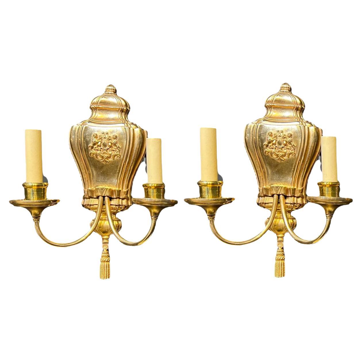 1920's Caldwell Gilt Bronze Sconces with Lions Shield For Sale
