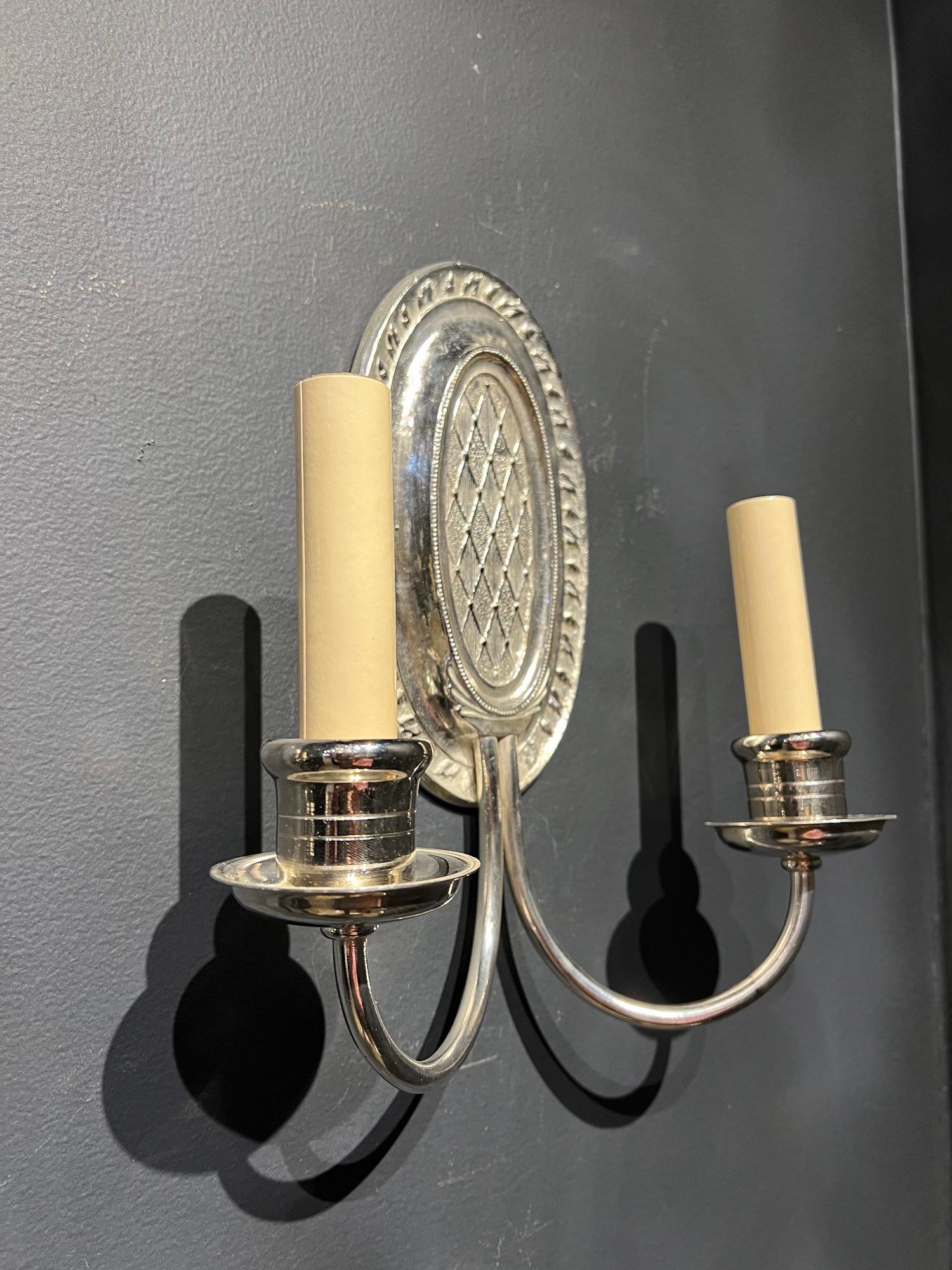 Early 20th Century 1920s Caldwell Silver Plated Oval Sconces For Sale
