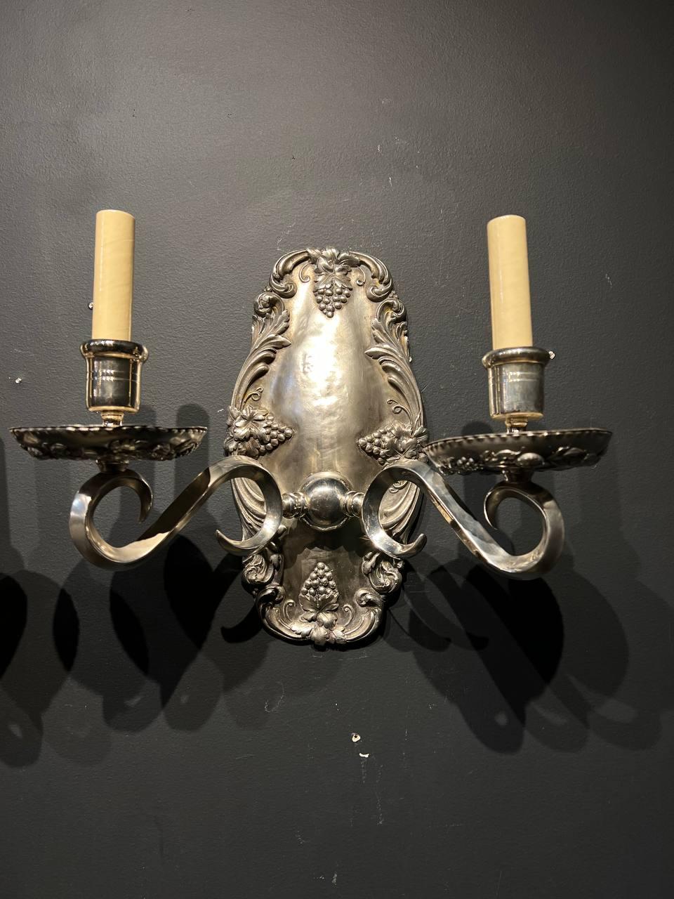 A pair of circa 1920’s silver plated Caldwell sconces with grapes on plate and cups. In very good vintage condition. 

Dealer: G302YP


