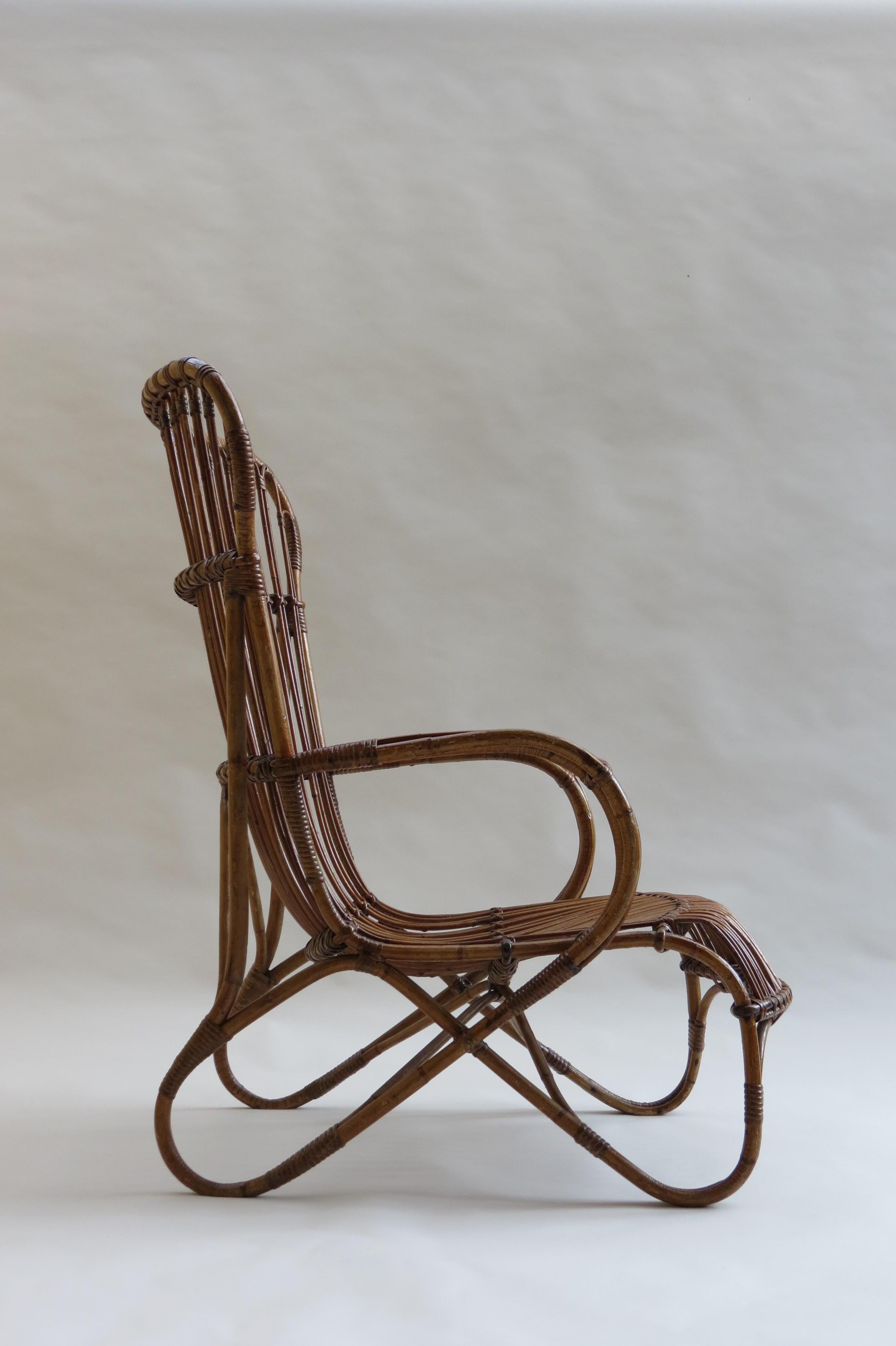 Lounge chair from the 1920s made from steam bent cane and rattan.

Good over all condition.

Possibly Swedish.

st920.

 