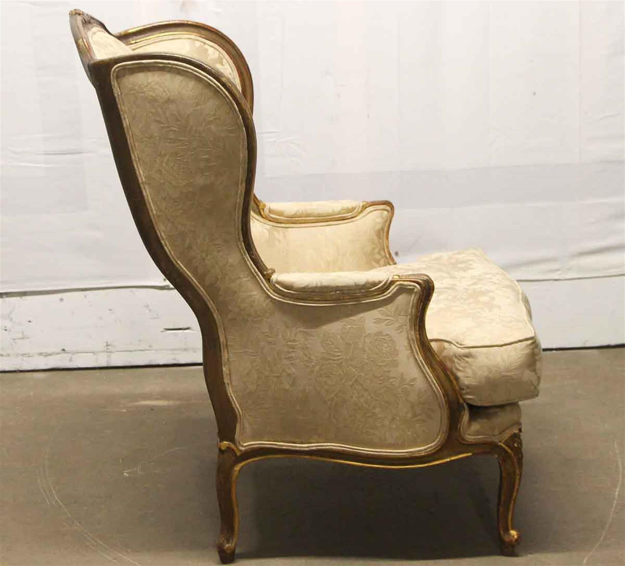 1920s Carved Wood Stuffed Wing Back Chair with Foral Cream Colored Upholstery In Good Condition In New York, NY
