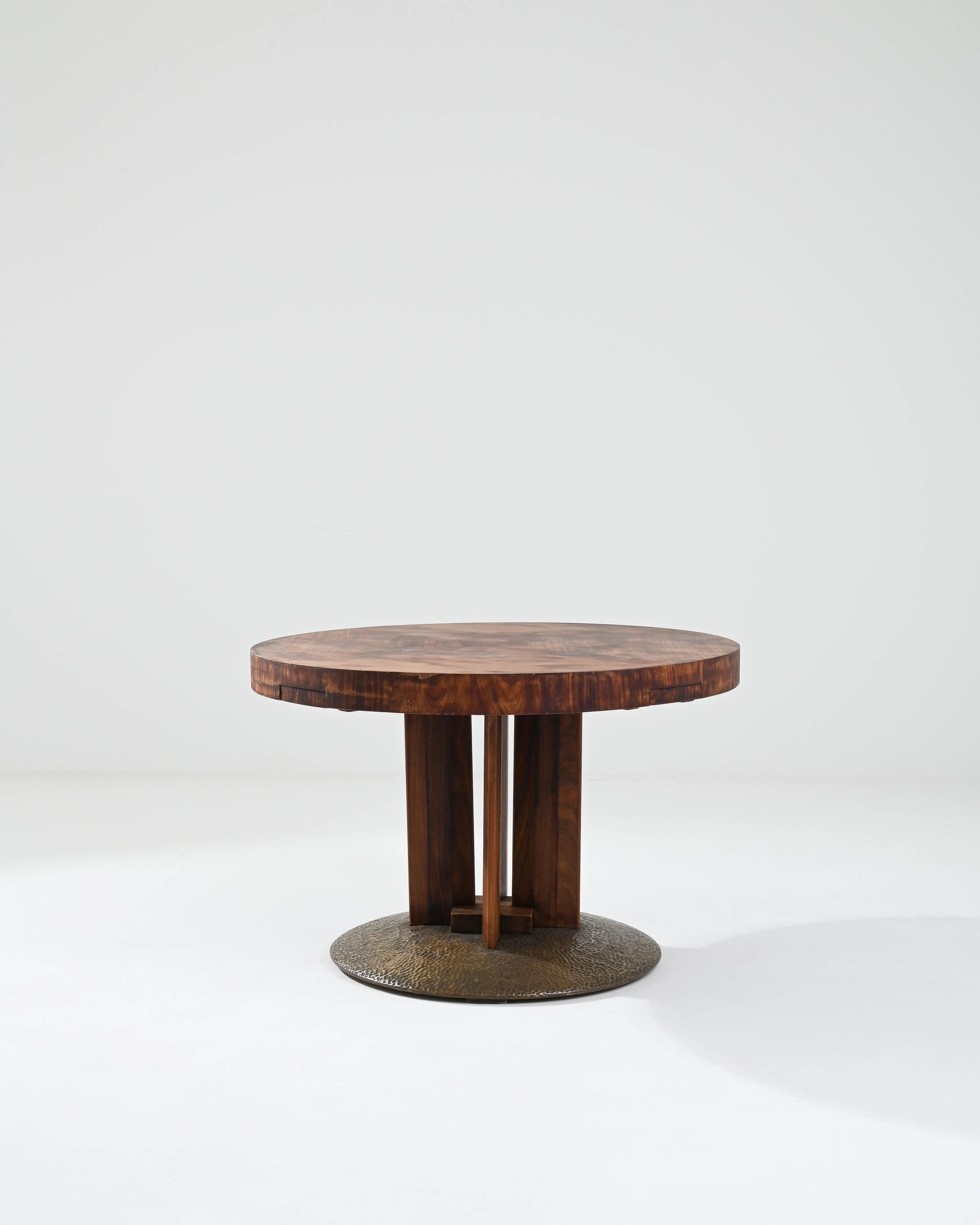 This iconic Art Deco bridge table evokes a moment in design history, capturing both the elegant simplicity and the revelry of the roaring 20s. Made in Central Europe, the table seats four players: hidden compartments pull out from the edges of the