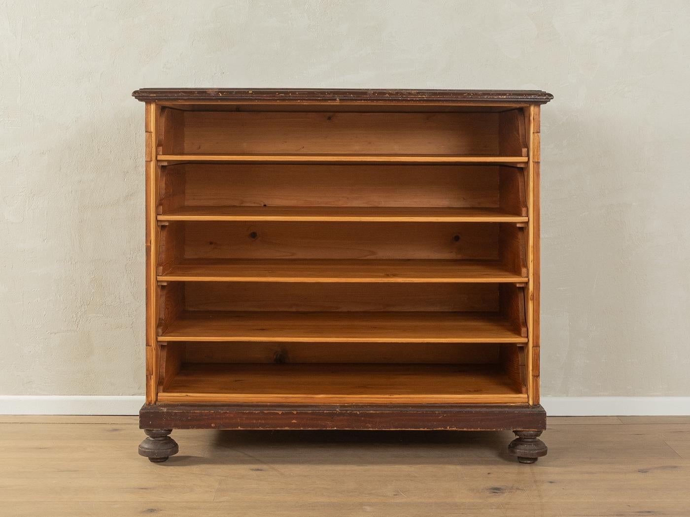 Classic open chest of drawers from the 1920s. High-quality walnut veneer corpus with four drawers and time-typical feet.

Quality Features:
very good workmanship
high-quality materials
solid wood drawers
Made in Germany