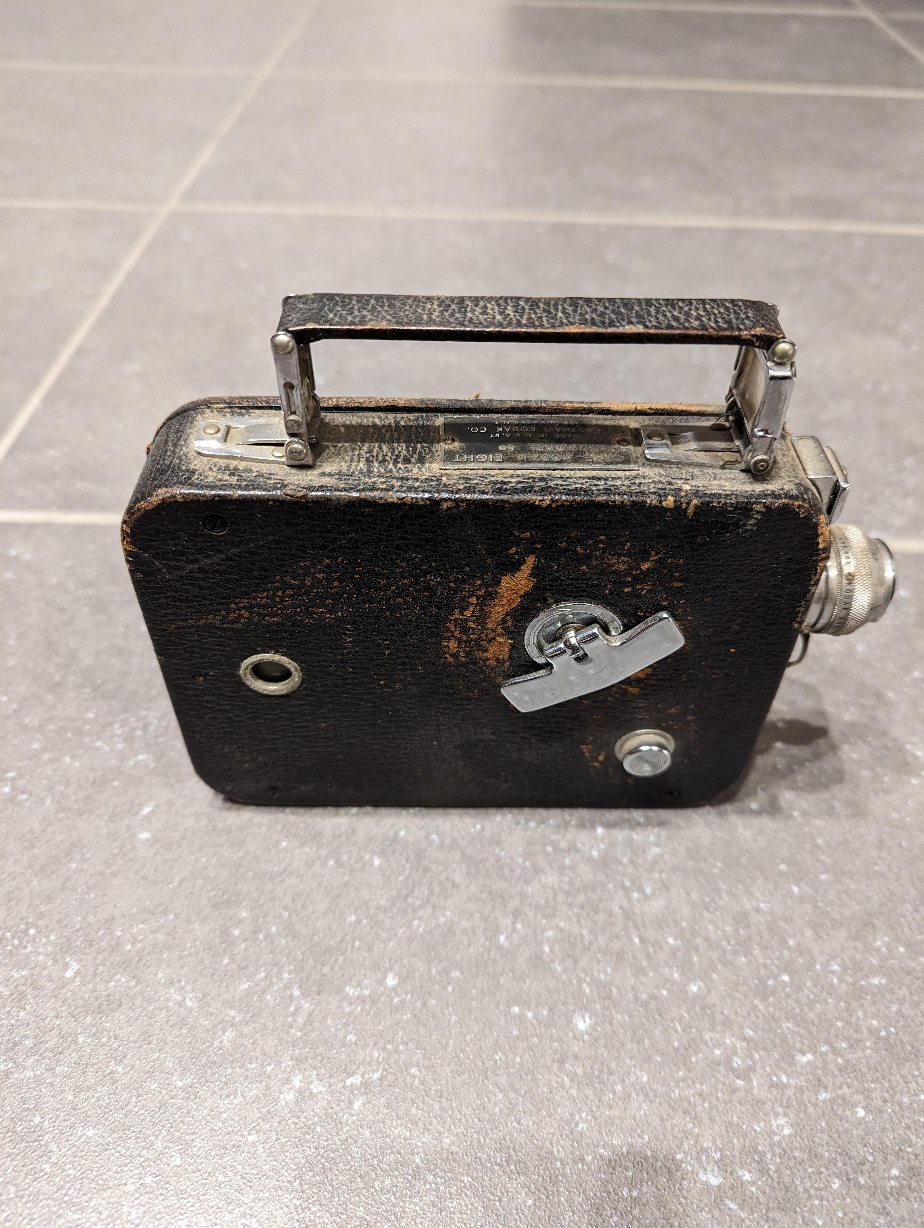 1920s Cine-Kodak Eight Model 60 In Distressed Condition For Sale In Cedar Falls, IA