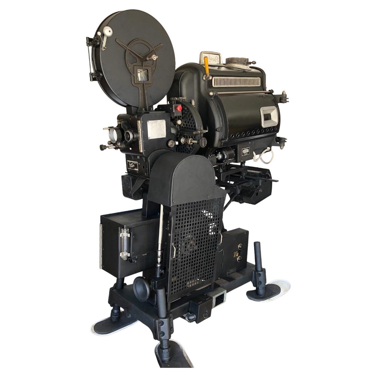 Contact us for more shipping options. Ships from Austin, TX. 

A stunning piece of cinematic history, Peerless Magnarc Movie Motion Picture 35mm Projector, Circa 1928 - 1930. The Simplex Projector was the standard of the industry back in the day and