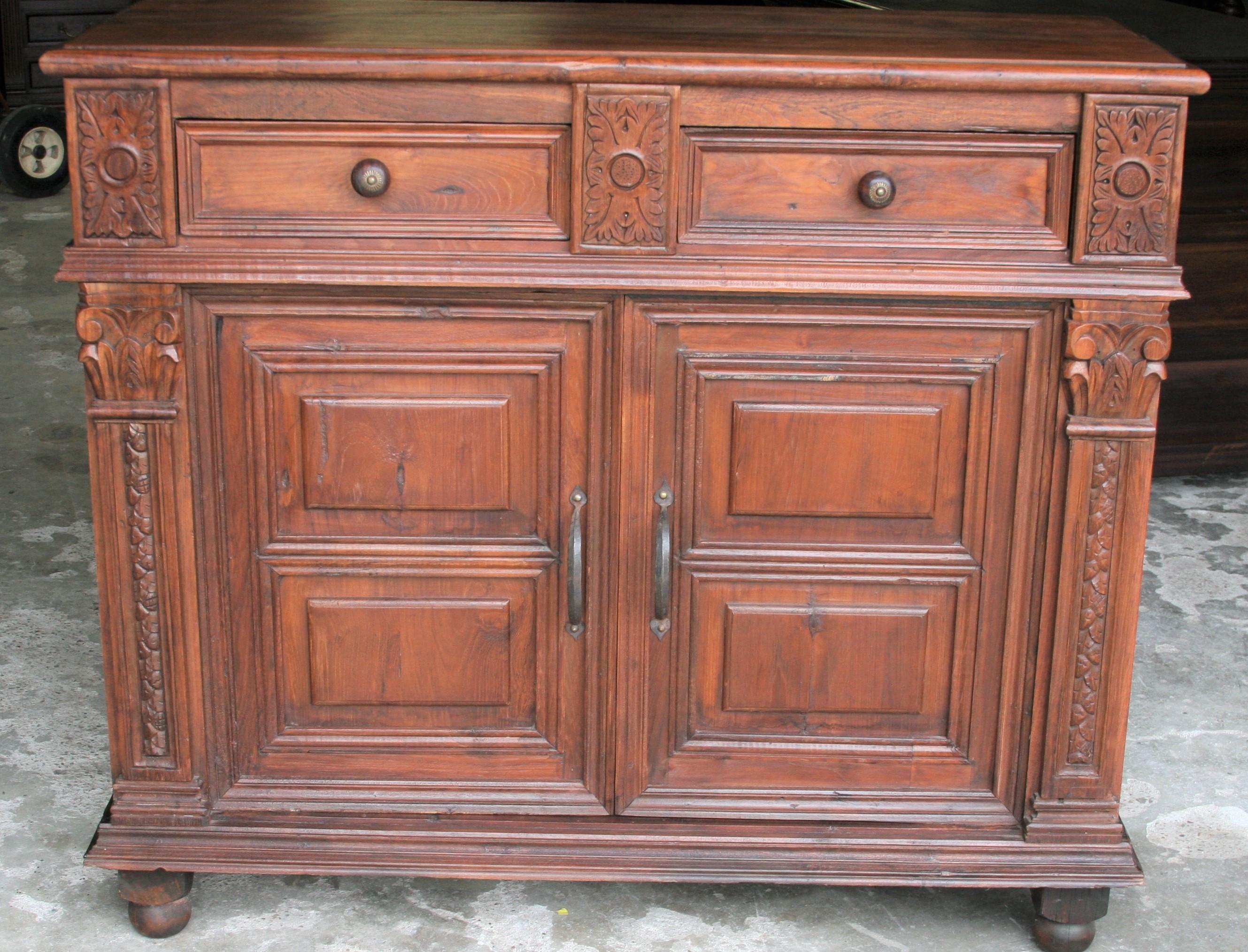 Superbly handcrafted this two doors and two drawers vanity once adorned the home of an European settler.
The carvings on this piece is exceptional. The pictures show every aspect of the vanity. It is durable and will last several generations. The