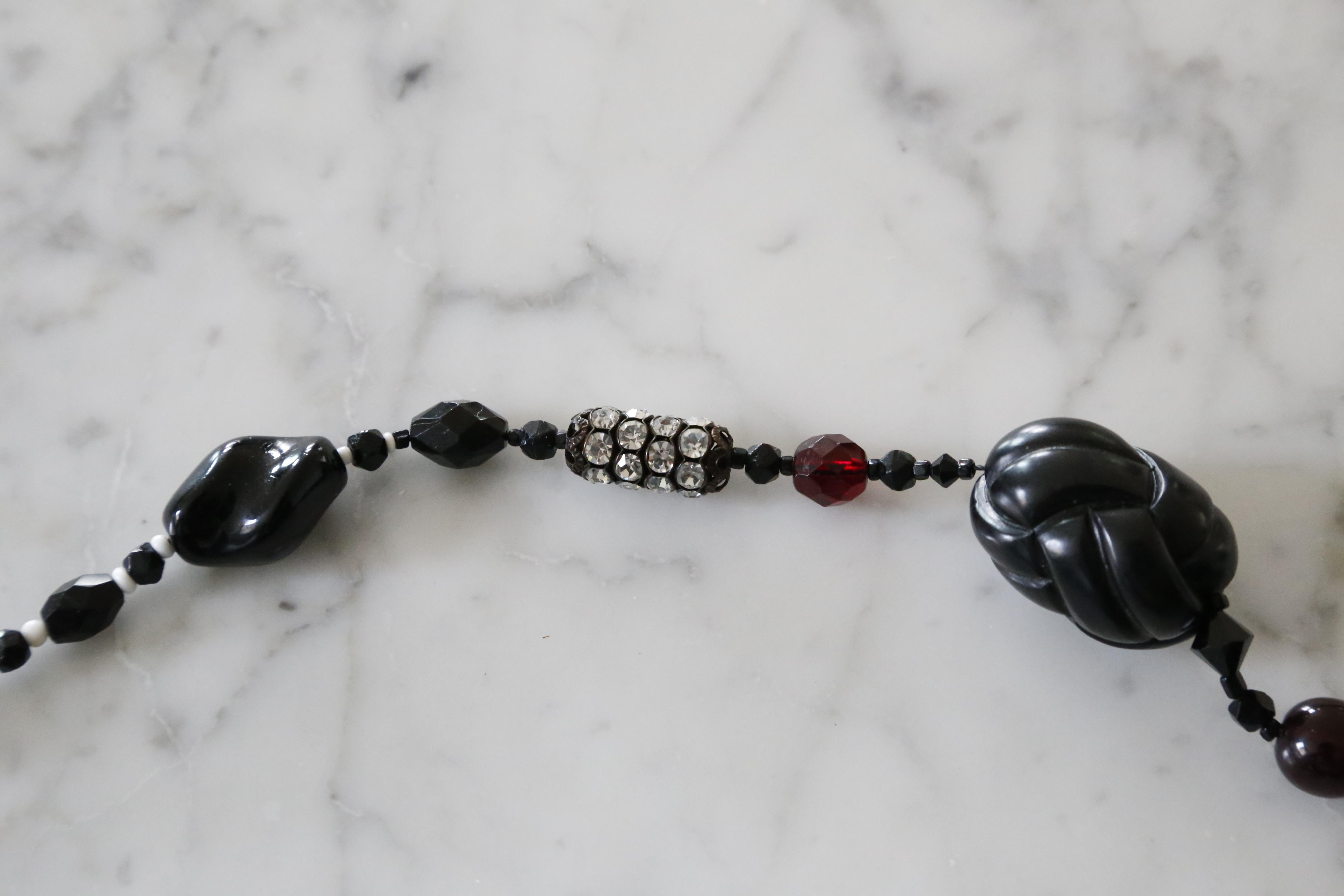 Unique Czech crystal and black glass Art Deco Sautoir necklace dating to the 1920's. Length is 54