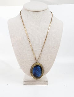 1920s Czechoslovakian Blue Glass and Brass Filigree Pendant