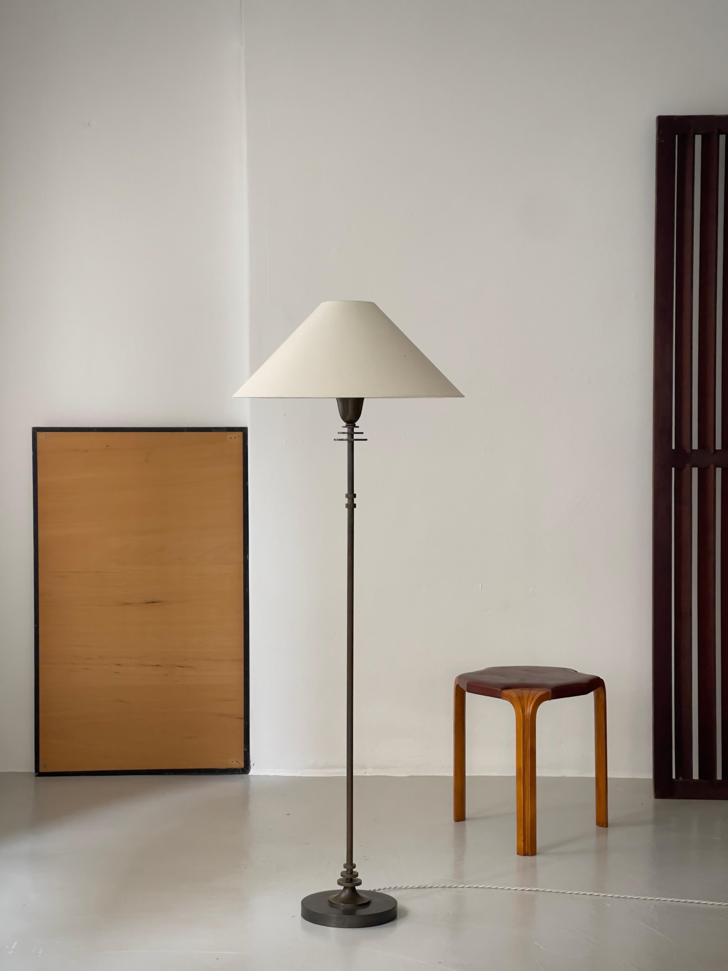 20th Century 1920s Danish Art Deco floor lamp in solid bronze. Just Andersen style metal work For Sale