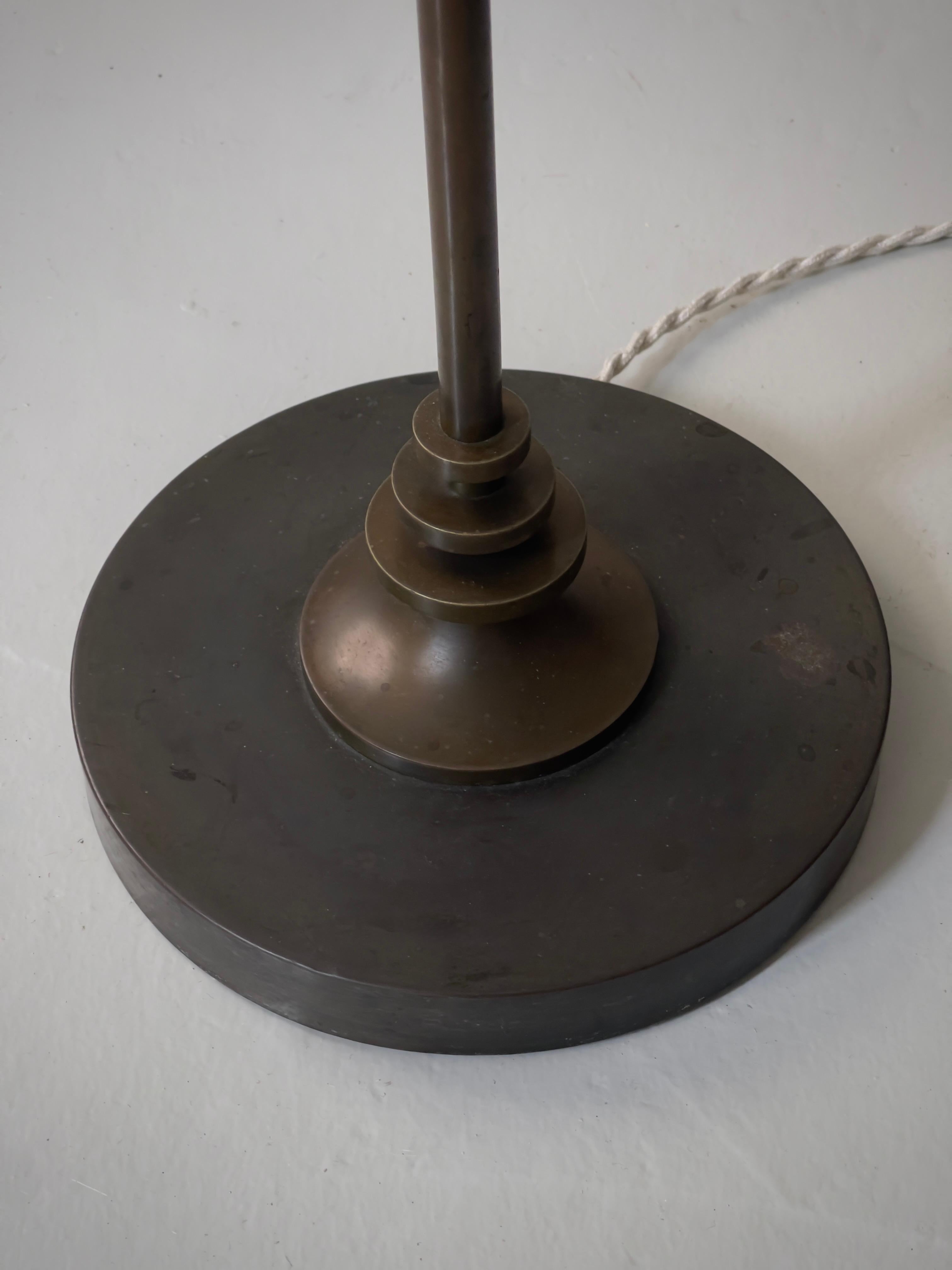 Bronze 1920s Danish Art Deco floor lamp in solid bronze. Just Andersen style metal work For Sale