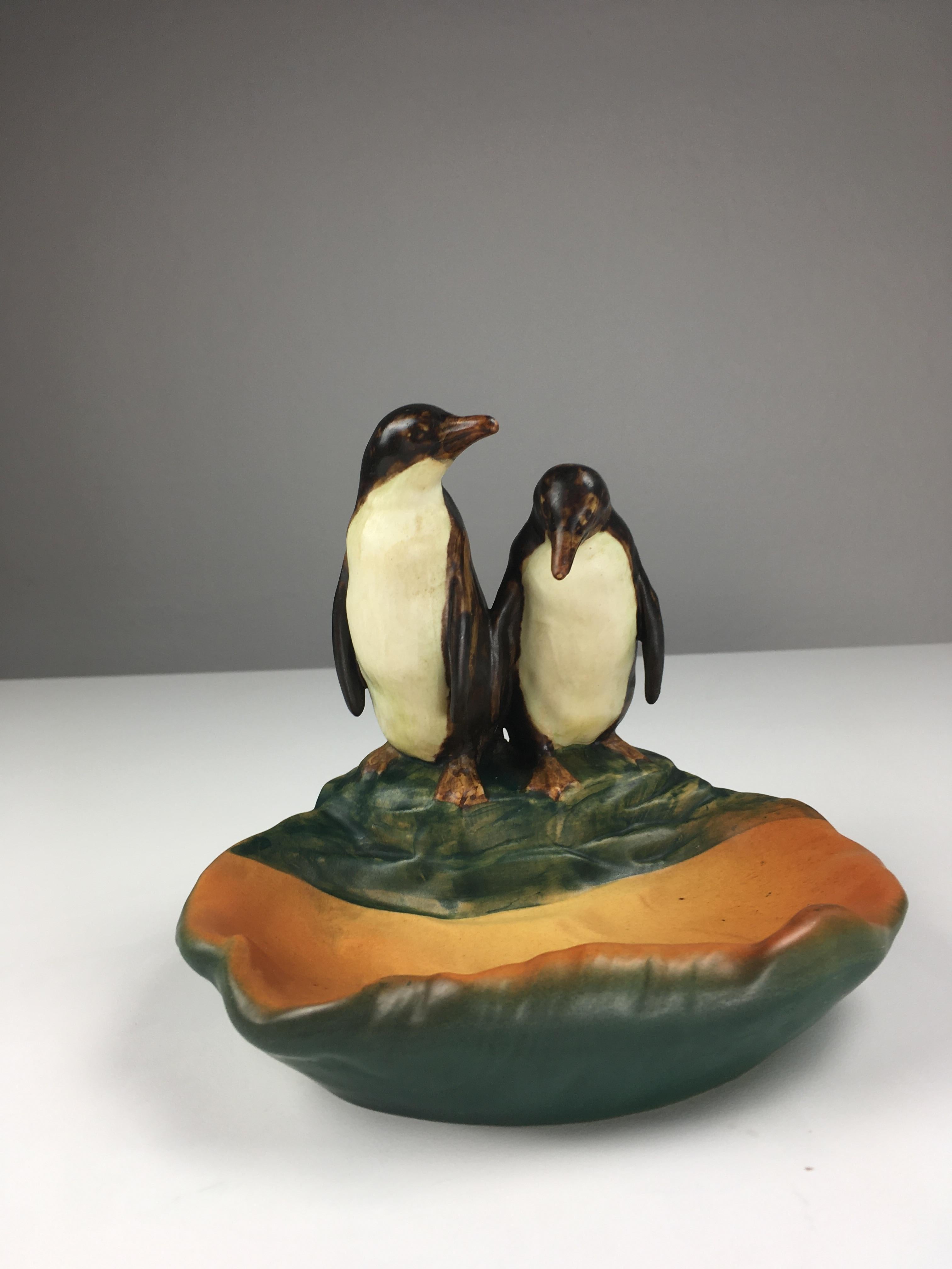 Danish hand-crafted Art Nouveau penguin ash tray / bowl designed by Lauritz Jensen in 1923 for P. Ipsens Enke.

The art nuveau ash tray / bowl feature a couple of lively penguins and is in excellent condition.

Ipsens Enke (1843 - 1955) was a