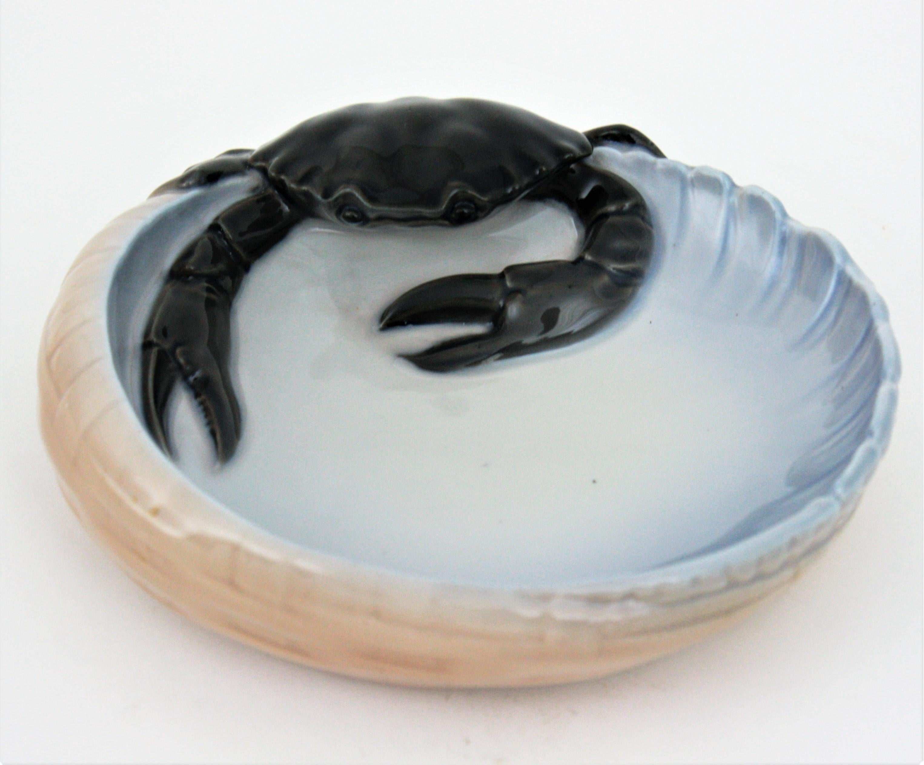 A funny Royal Copenhagen porcelain basket bowl, dish or ashtray with a highly decorative crab figurine, Denmark, circa 1923.
This piece is in excellent condition and it is stamped with the manufacture's marks on the back.
Useful as jewelry bowl,