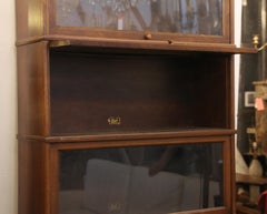 1920s Dark Wood Tone Five-Section Barrister Bookcase with Pull Out Glass Doors