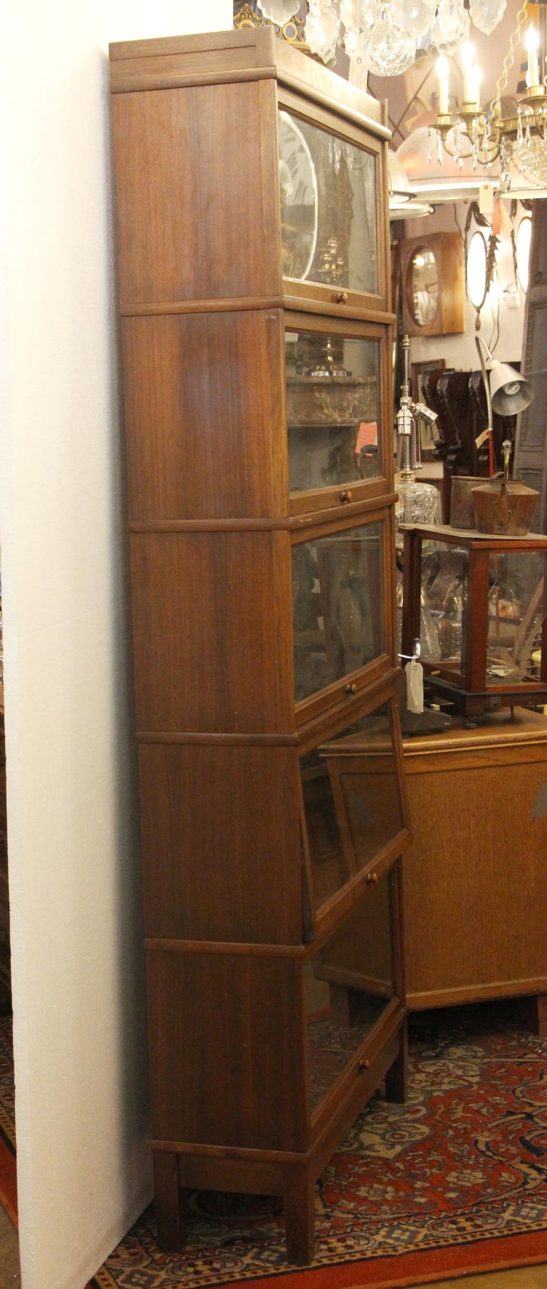 1920s Dark Wood Tone Five Section Barrister Bookcase With Pull Out
