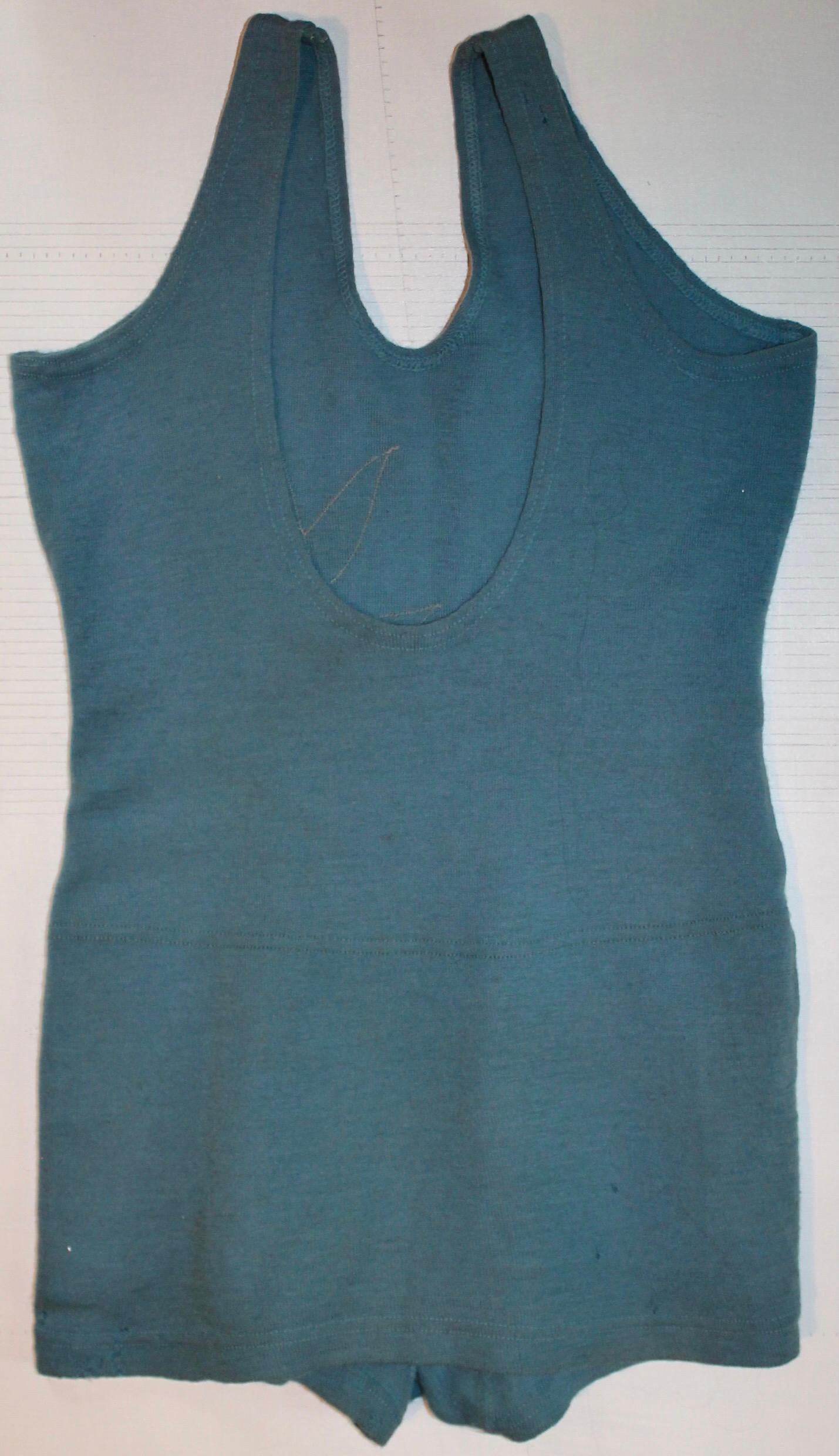 Early and rare woman's one piece blue bathing 'costume', Very 'deco' and 'flapper' in period. (not to mention the proto Matisse 'Cutout collage' appliqués).