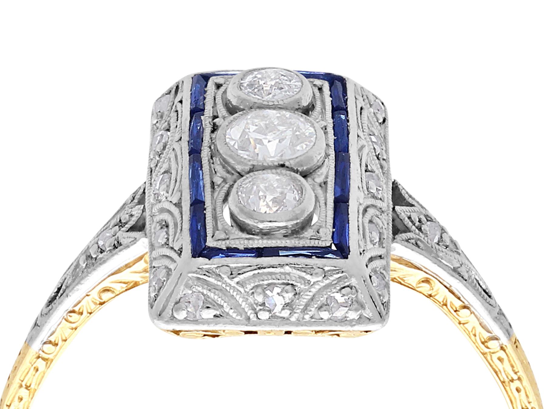 An impressive antique Art Deco 0.37 carat diamond, 0.16 carat sapphire and 14 karat gold cocktail ring; part of our diverse antique jewelry collections.

This fine and impressive 1920s Art Deco diamond and sapphire ring has been crafted in 14 k