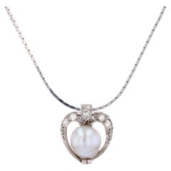 1920s Diamond Fine Pearl Platinum Pendant and 18 Karat White Gold Chain Necklace