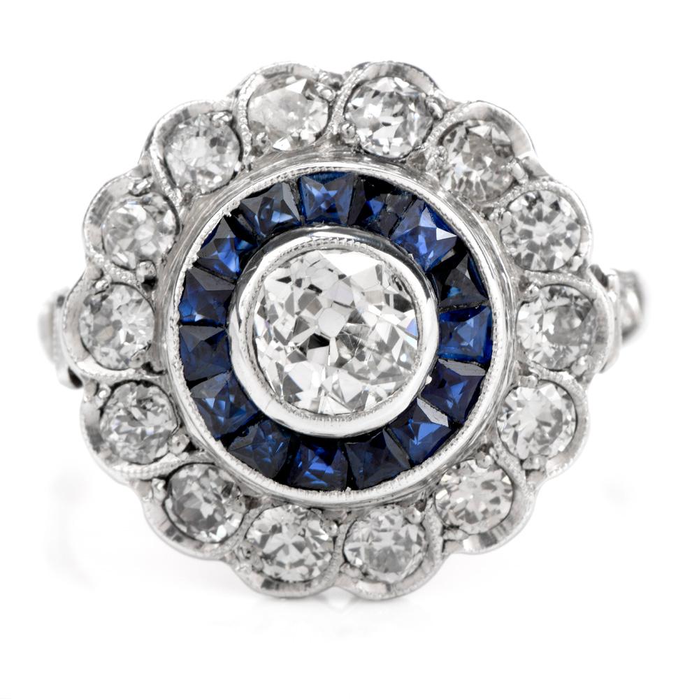 Adore this charming Antique Diamond Sapphire Platinum Old European Cut Cluster Ring!  This ring is crafted in quality platinum.  It showcases one old European cut genuine diamond, bezel set, of approximately 0.65 carats, H-I color and VS2 clarity.
 