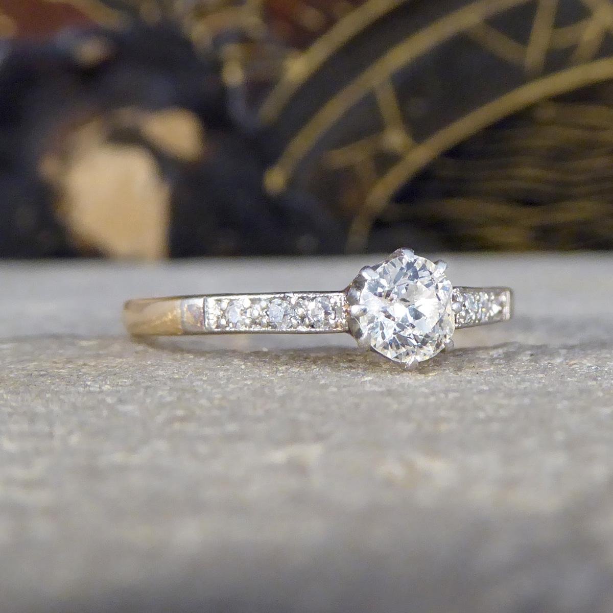 Embrace antique elegance with this 1920's Diamond solitaire engagement ring beautifully crafted in 18ct Yellow Gold and Platinum. The centre piece is a dazzling 0.35ct Old European Cut Diamond, set in platinum to enhance its brilliance with very