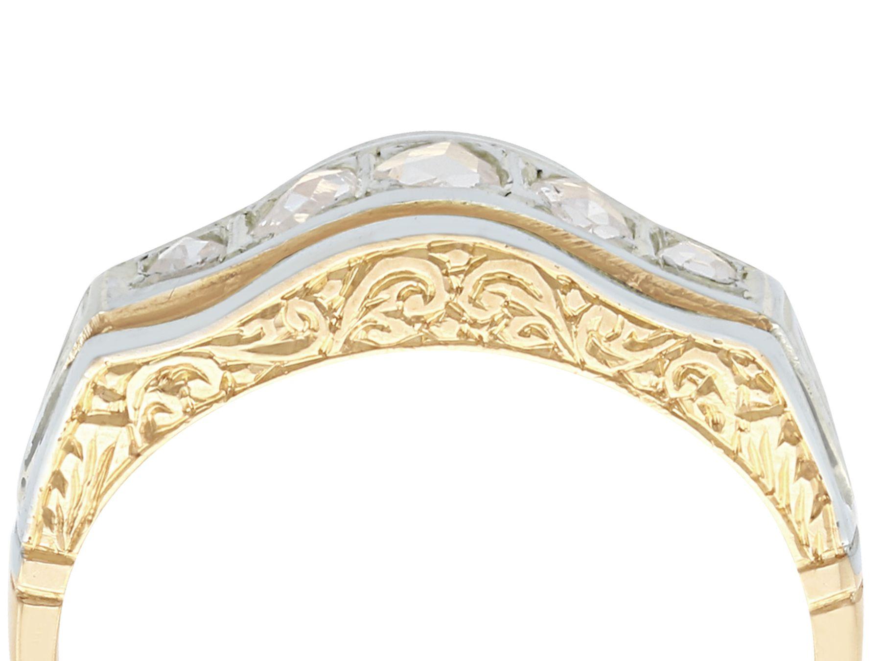 An impressive antique 0.51 carat diamond and 18 karat yellow gold, 18 karat white gold set five stone dress ring; part of our diverse antique jewelry collections

This fine and impressive five stone diamond band ring has been crafted in 18k yellow
