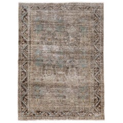 1920s Distressed Antique Turkish Sivas Rug, Earth Tones, Light Blue Accents