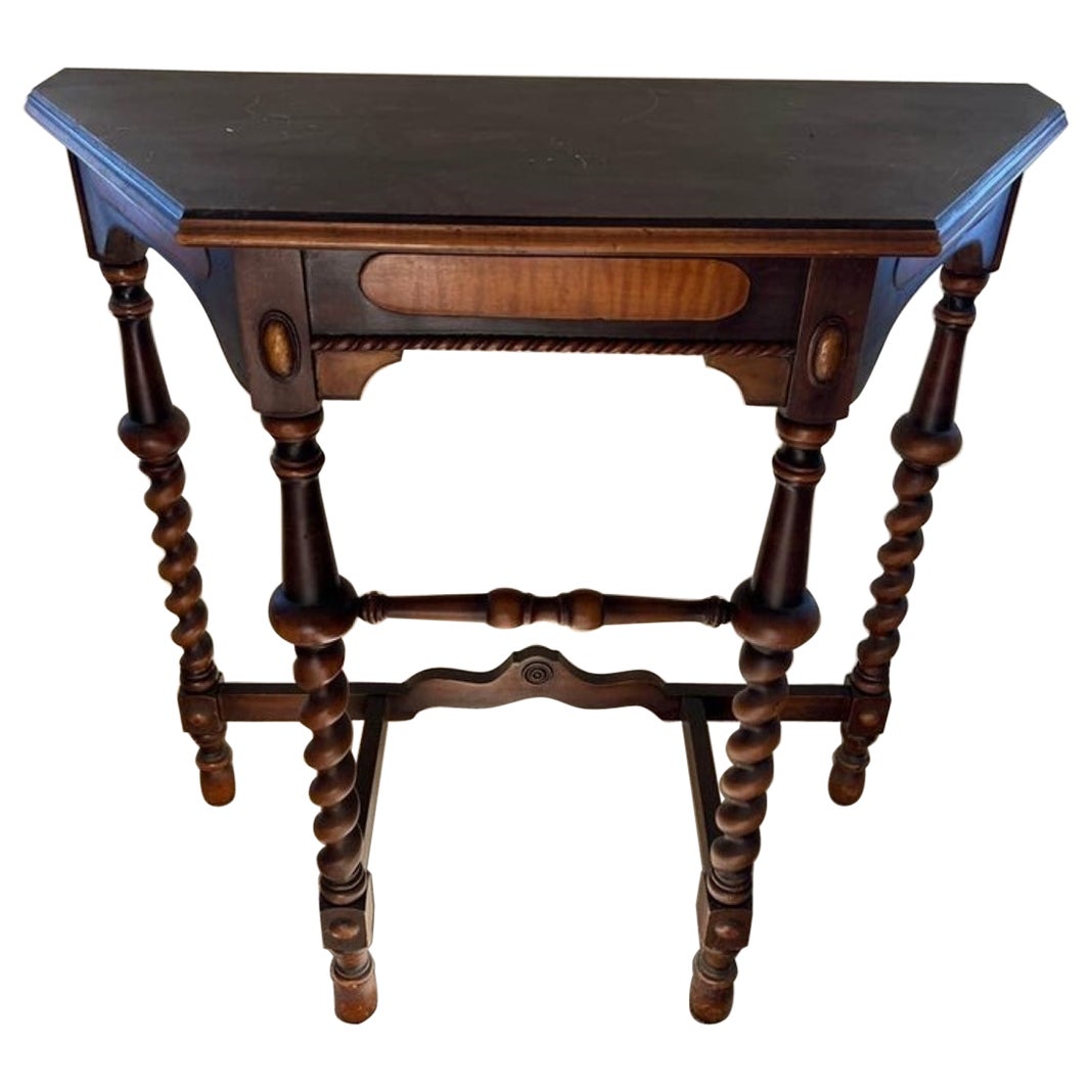 Beautiful Edwardian console table in dark walnut. Barley twist legs.
Absolutely gorgeous. Very solid and steady. Good vintage condition.
Measures 32