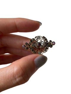 1920s Edwardian Revival Openwork Filigree Brooch with Purple Rhinestones