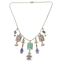 1920s Egyptian Revival Silver Gilt and Enamel Antique Charms Necklace