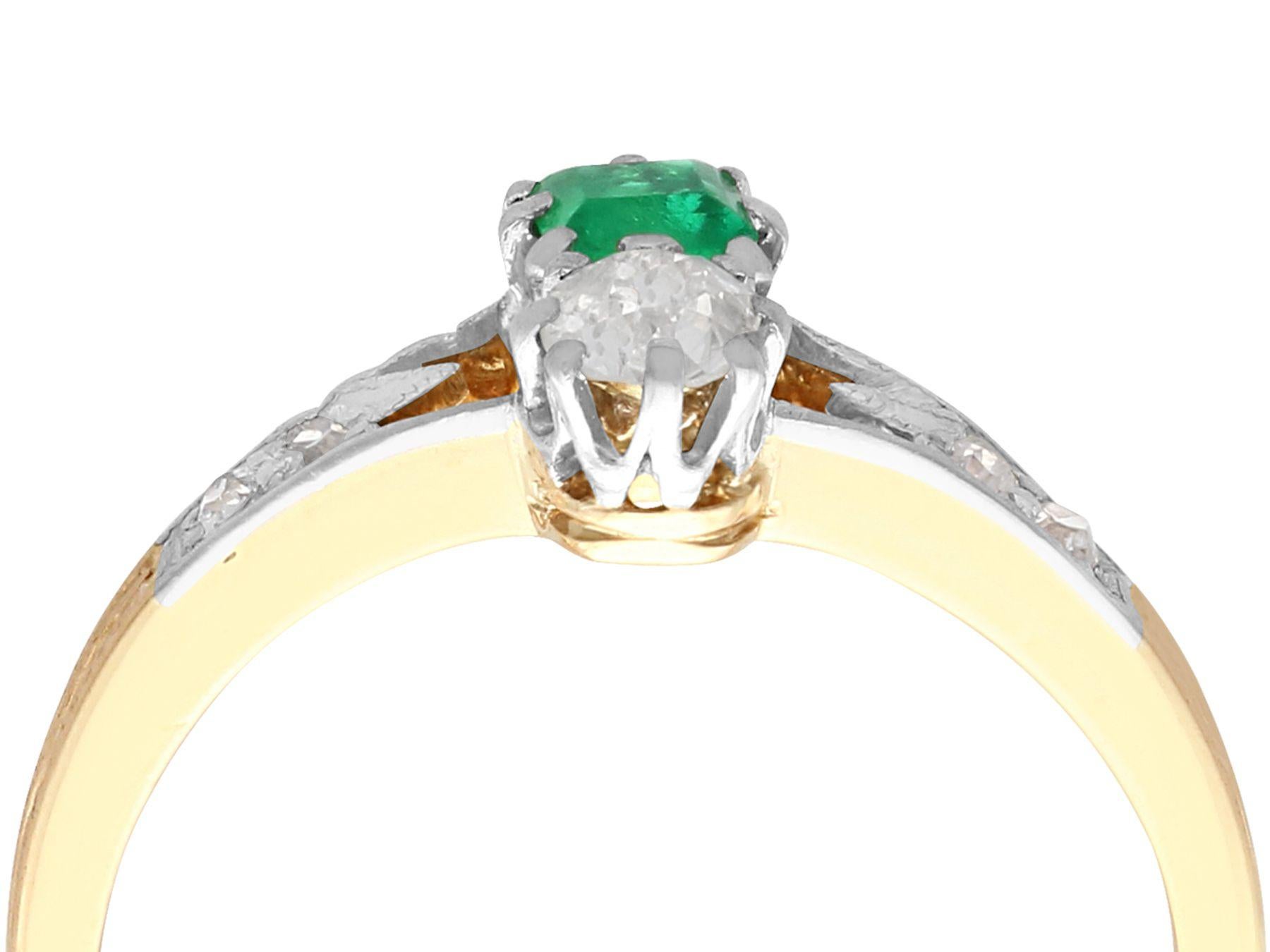 A fine and impressive antique German 0.24 carat natural emerald and 0.23 carat diamond, 14k yellow gold and 14k white gold set cocktail ring; part of our antique jewelry and estate jewelry collections

This fine and impressive antique emerald and