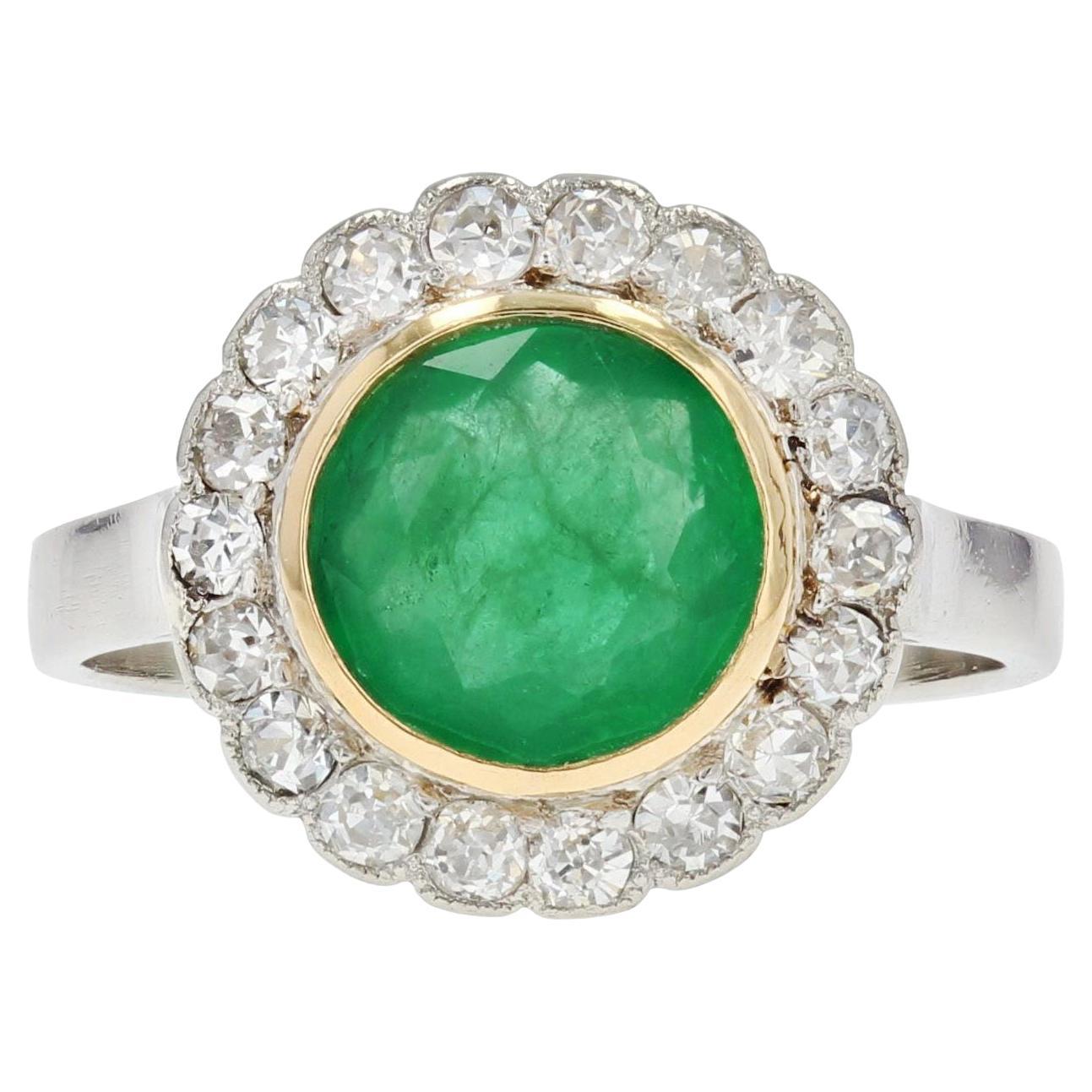 1920s Emerald Diamonds Platinum 18 Karat Yellow Gold Round Ring For Sale