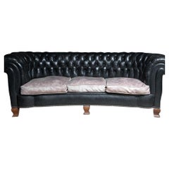 1920s English Chesterfield Sofa, Curved Form with Mahogany Deco Feet