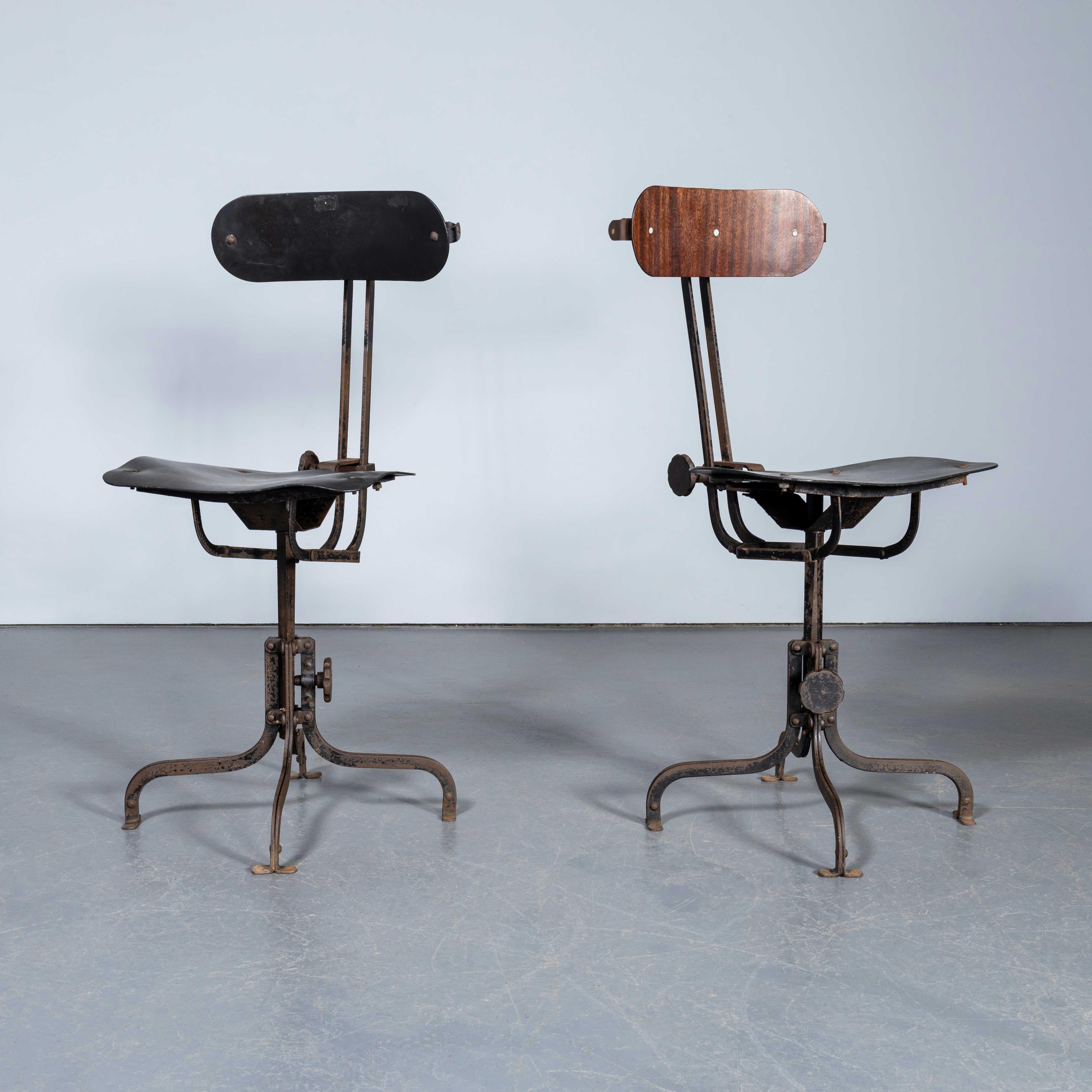 1920's English Industrial Swivelling Machinists Chairs - Pair. 
We discovered these tucked away in a warehouse when clearing a batch of industrial lights in the Midlands. They are very reminiscent of Evertaut but these are 1920's and Evertaut began