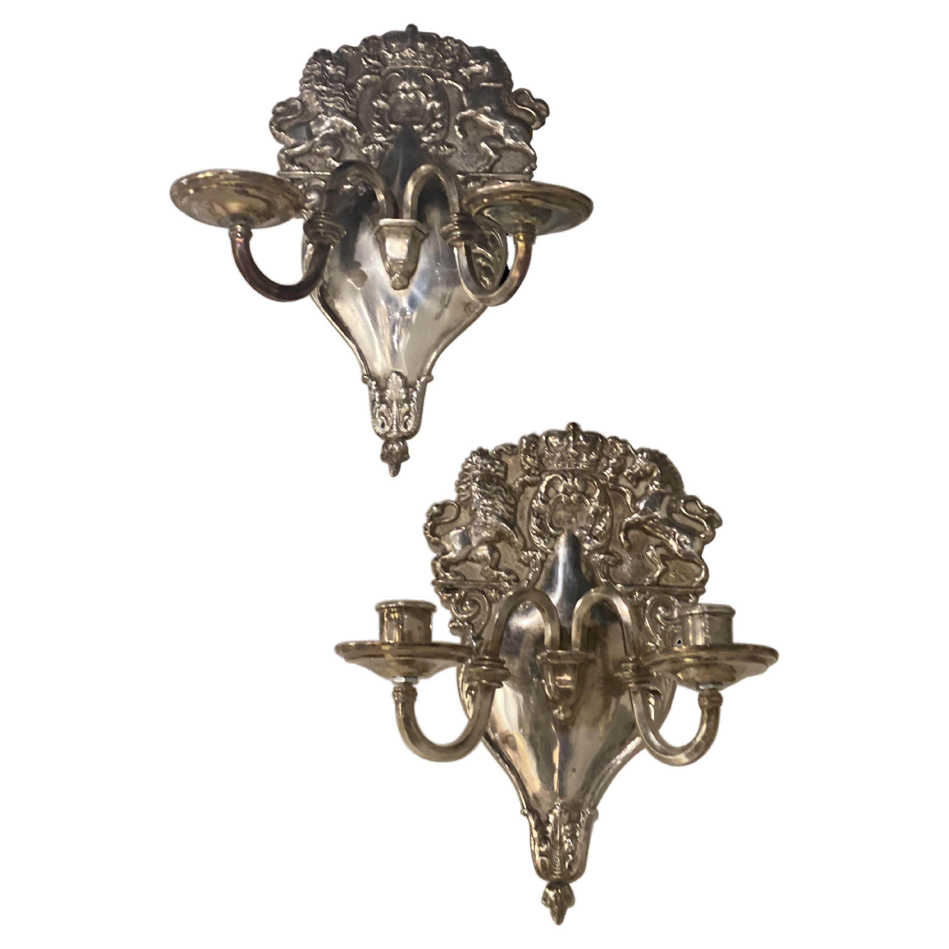A pair of circa 1920's English silver plated double lights  sconces with lion and unicorn on design 