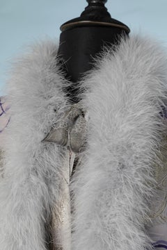 1920's evening coat in printed silk and silver lurex damask with feather edge