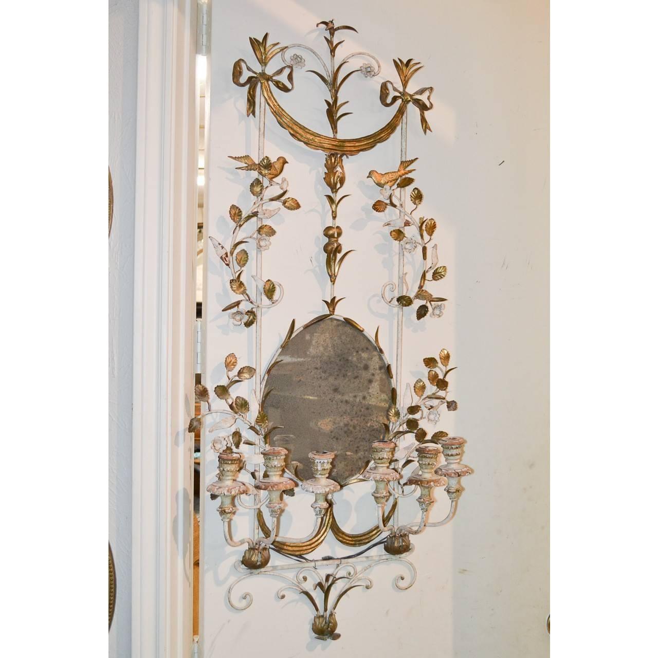 Romantic early 20th century metal wall sconce for six candles. Antique mirror centerpiece.
Collected in Paris, France. Exceptional.