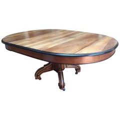 1920s Extending Walnut Italian Dining Table with Hand-Carved Base on Wheels