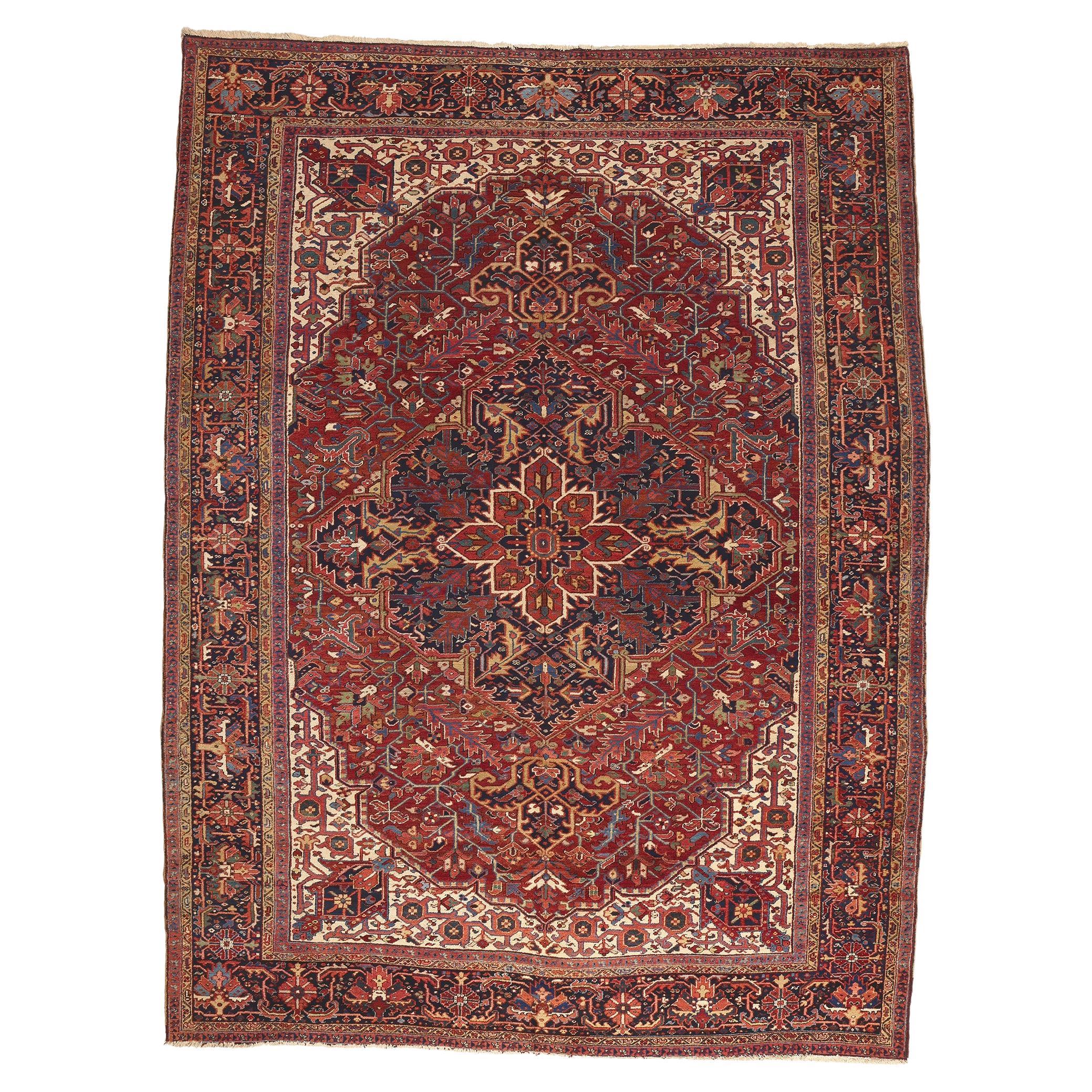 Grand tapis persan rouge ancien Heriz des années 1920 