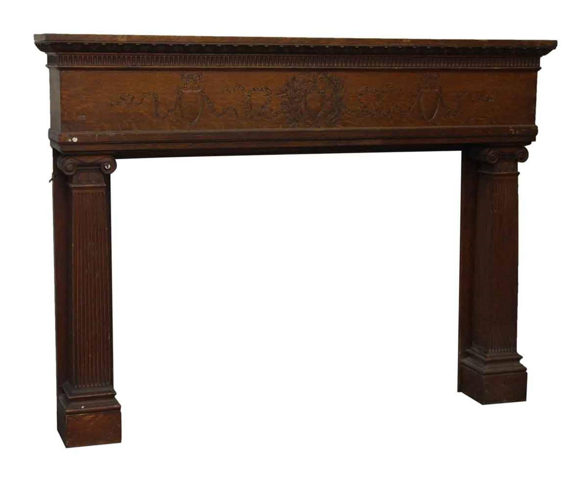 1920s extra wide mantel with hand-carved details adorning the face plate of the mantel. This can be seen at our 400 Gilligan St location in Scranton, PA.