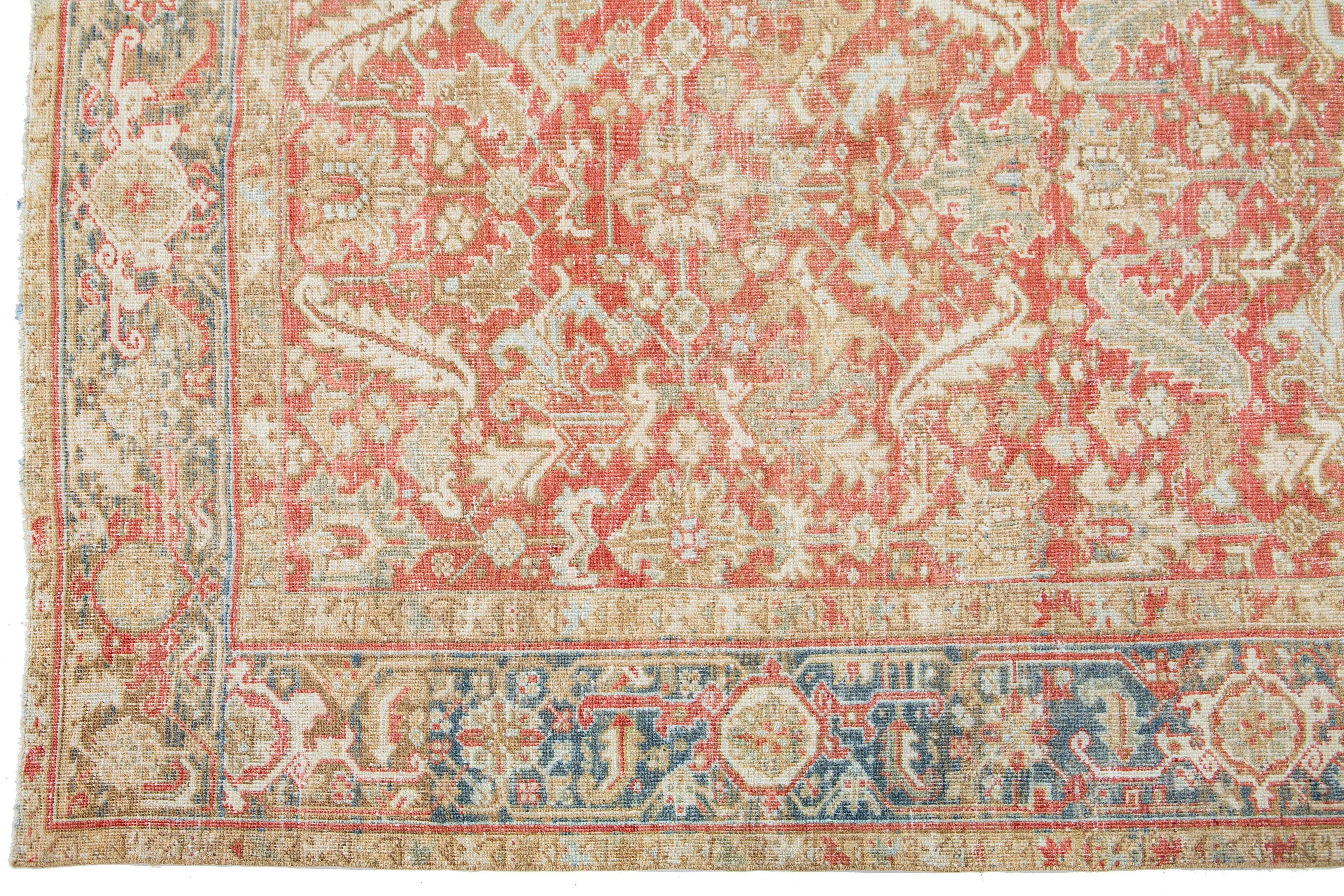 1920s Floral Antique Persian Heriz Wool Rug Featuring a Rust color In Good Condition For Sale In Norwalk, CT