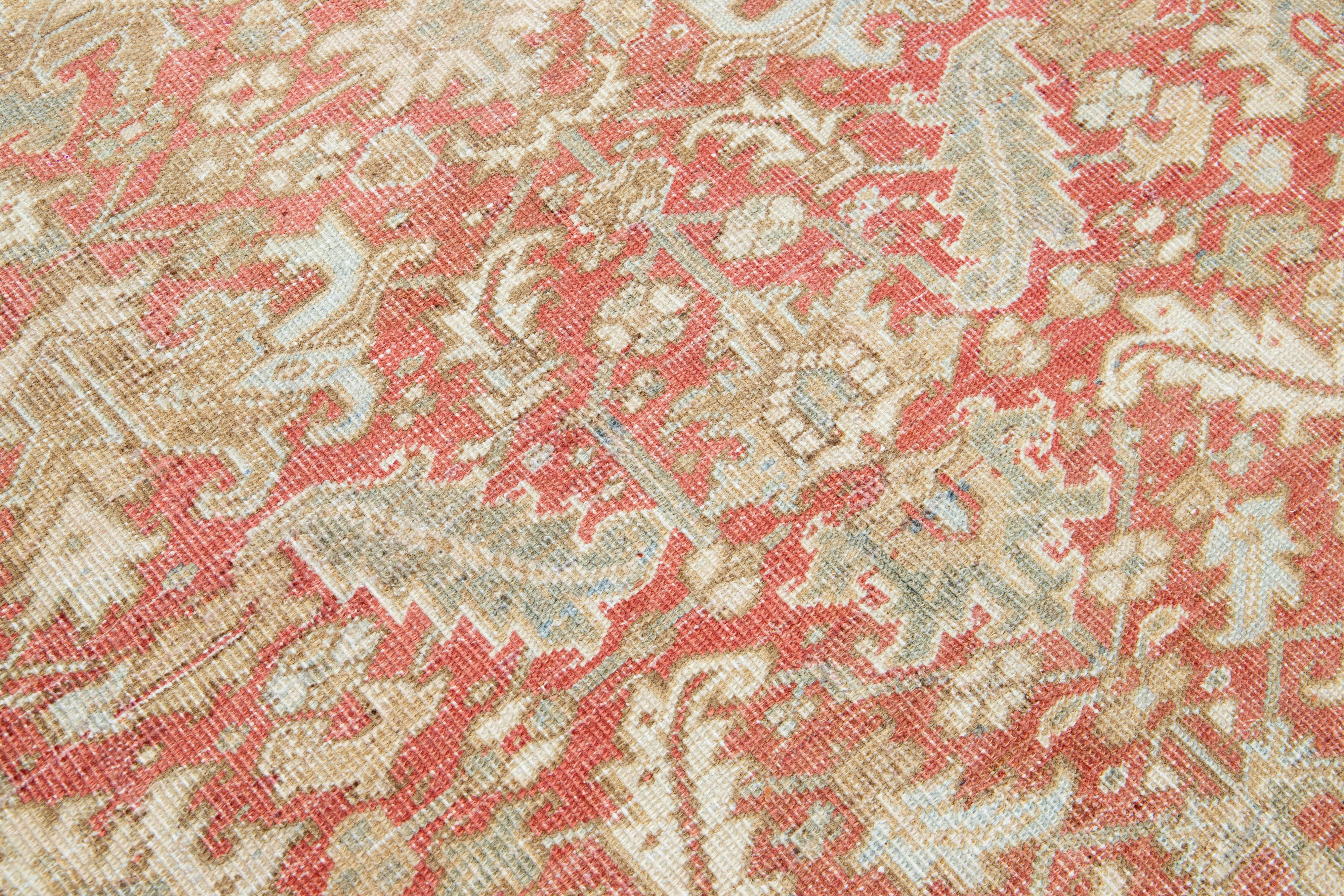 1920s Floral Antique Persian Heriz Wool Rug Featuring a Rust color For Sale 1