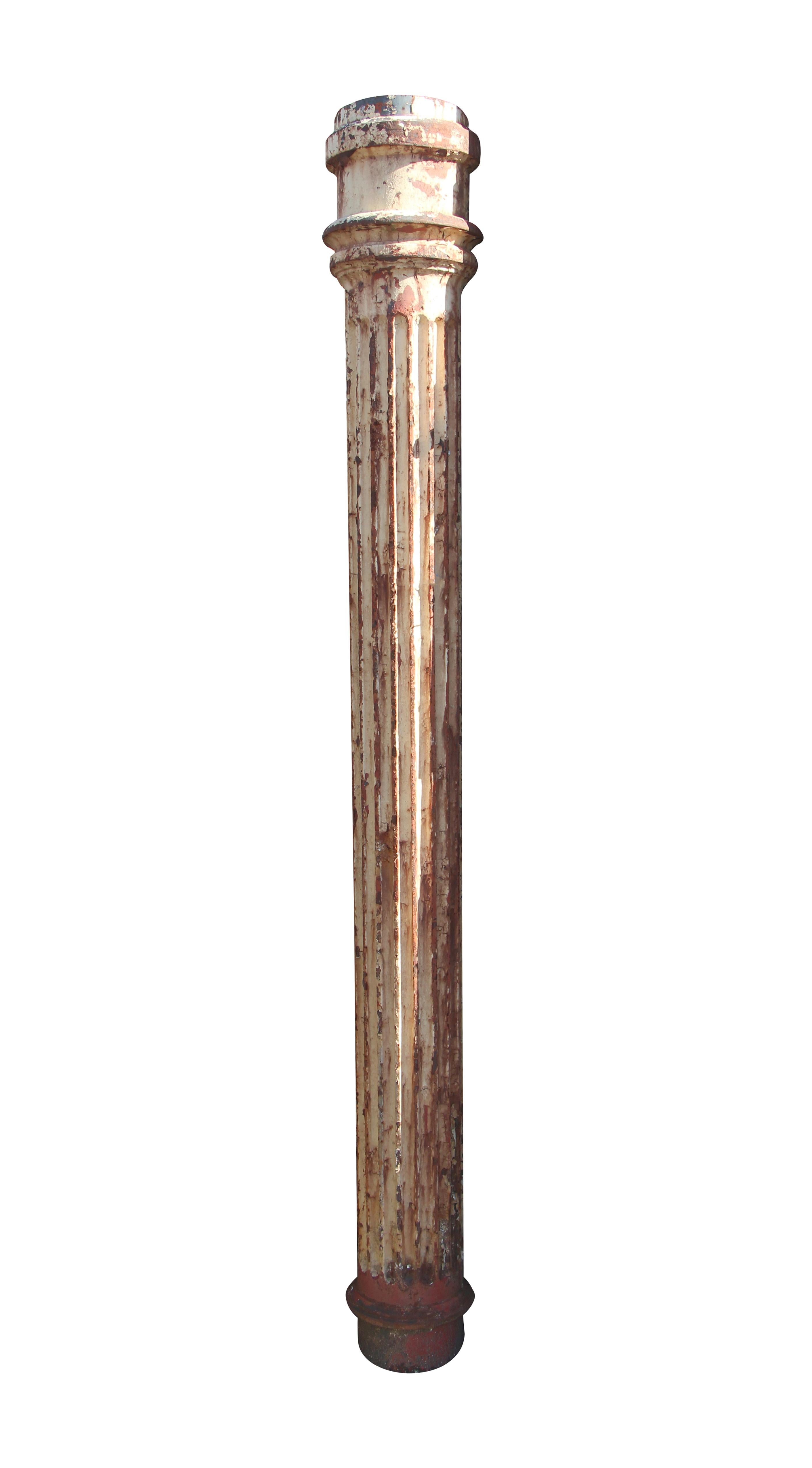 Antique cast iron fluted structural column reclaimed from New York City building. This 1920s column measures, 86 in. H x 8 in. diameter, and the top is 12 in. diameter. One available. Please note, this item is located in our Scranton, PA location. 