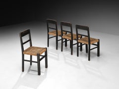 1920s Francis Jourdain Set of Four Dining or Side Chairs in Dark Wood and Rush