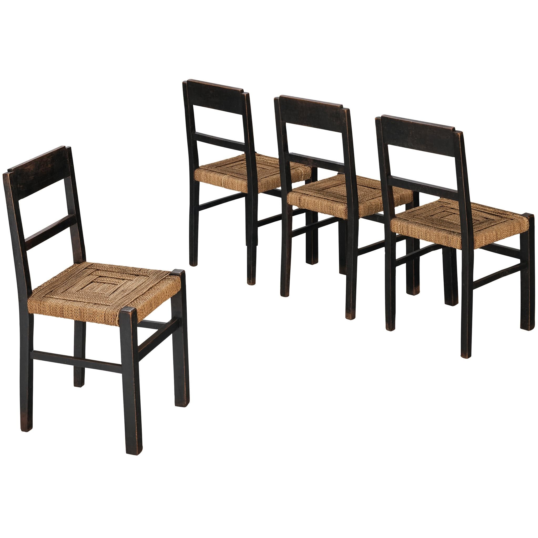 1920s Francis Jourdain Set of Four Dining or Side Chairs in Dark Wood and Rush