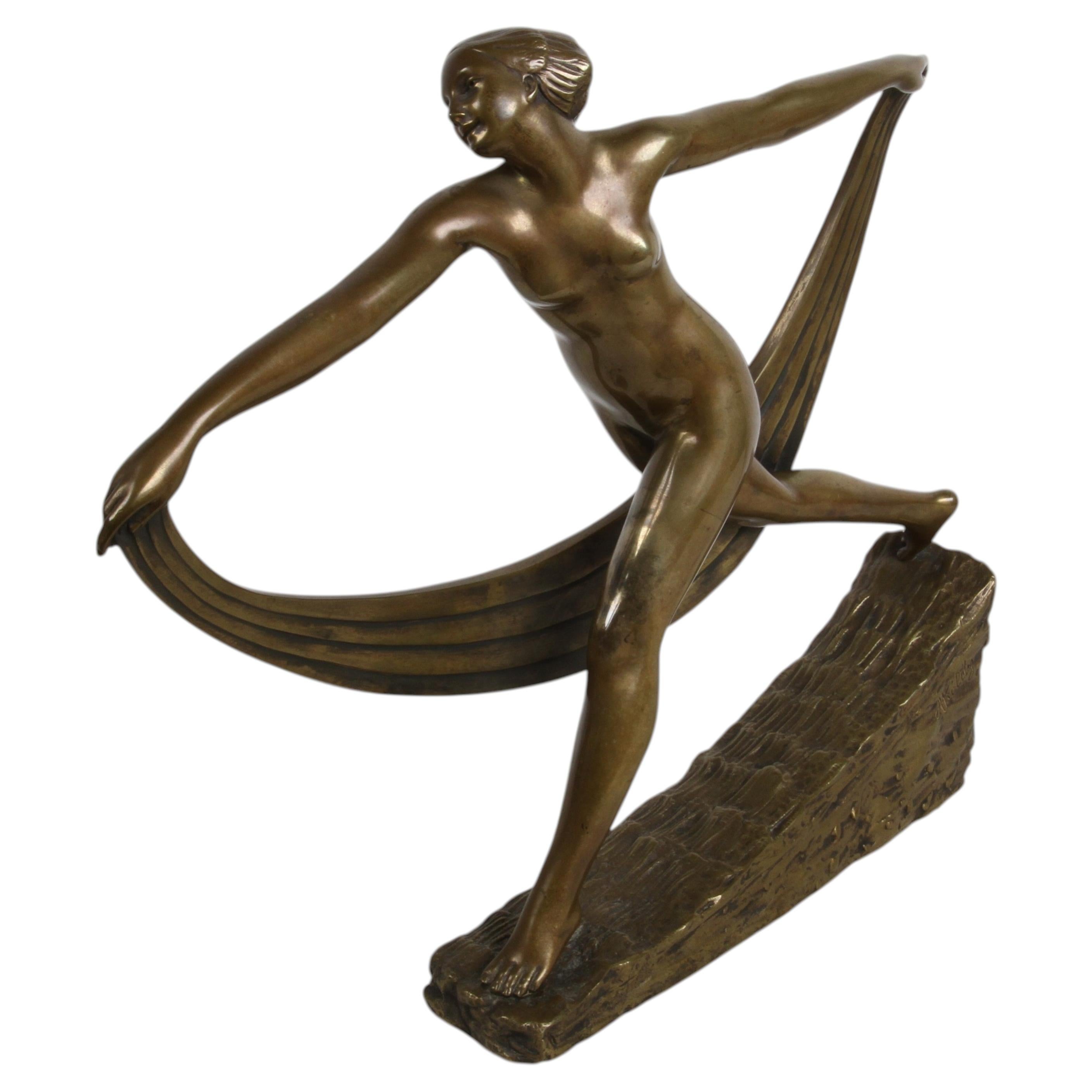 Sculpture Art déco française des années 1920 représentant un nu en bronze, intitulée « La danseuse au foulard », réalisée par Alexandre Kéléty