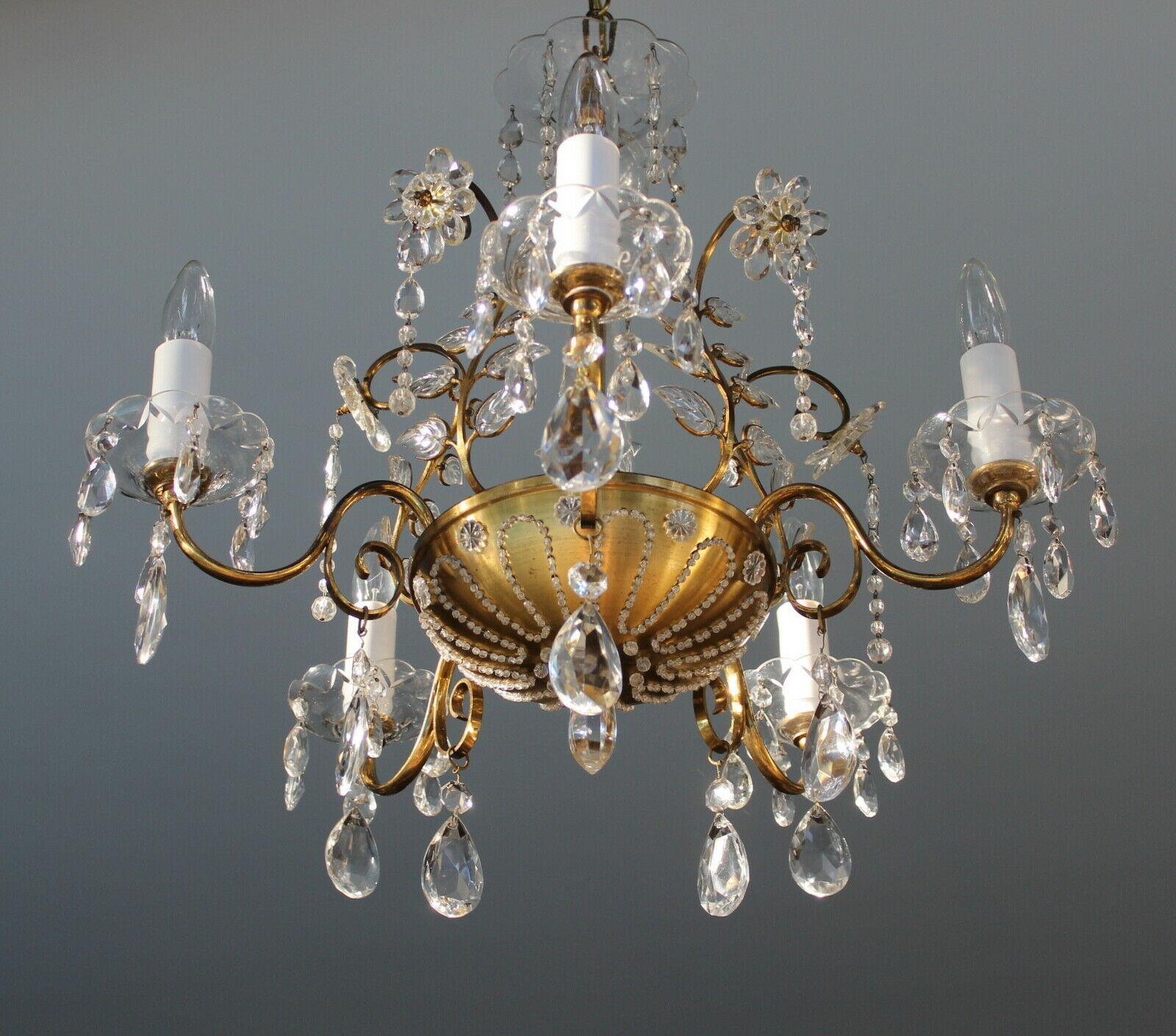 French Art Deco 1920's Bronze/ Brass & Cut Crystal Floral Chandelier. This chandelier is amazing. Please note the impeccable detail. From Maison Bagues Paris. Purchased in France while on a buying trip.