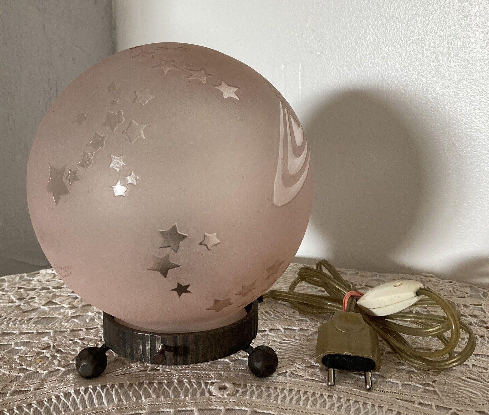 c1920's French Art Deco Pink Sandblasted Art Glass Table Lamp Signed by Sprat. Featuring shooting stars, planet Saturn. Iron Base. This is a rare treasure.