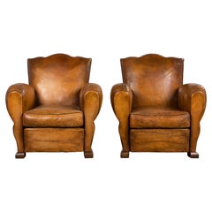 1920s French Art Deco Scalloped Back Club Chairs in Caramel Leather – A Pair