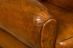 Pair of 1920s French Art Deco Club Chairs in Cognac Leather, Scalloped Back