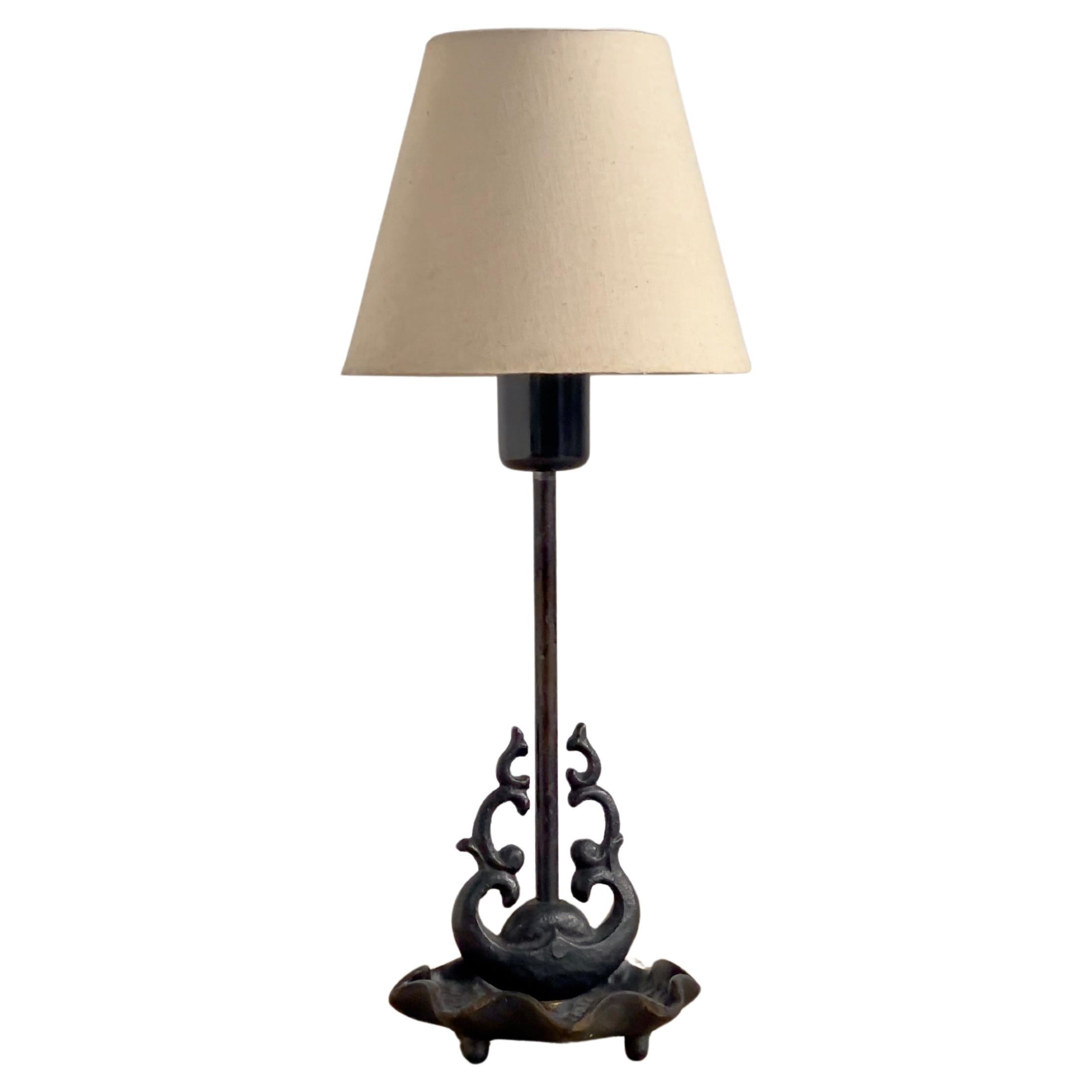 1920s french Art Nouveau table lamp in patinated black cast bronze, linen shade.